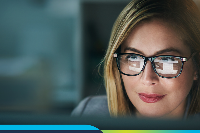 Woman staring at laptop