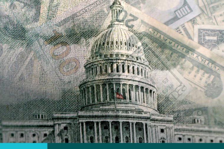 Blended image of the U.S. Capitol and U.S. paper currency