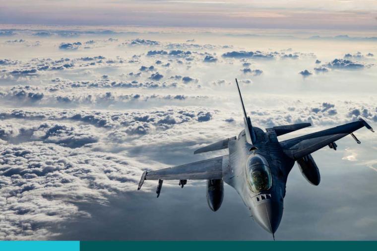 Fıghter Jet flying over clouds