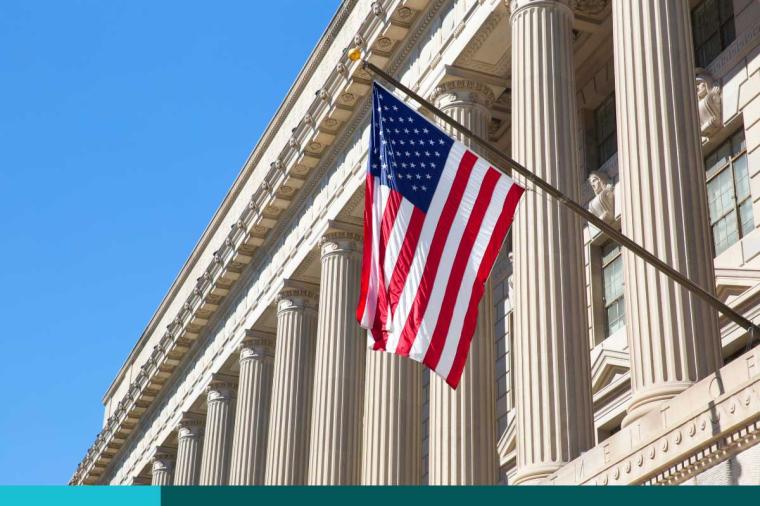 Department of Commerce in Washington DC, America. American flag flying.