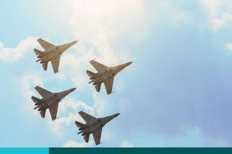 Group of four aircraft fighter jet airplane sun glow toned gradient clouds sky