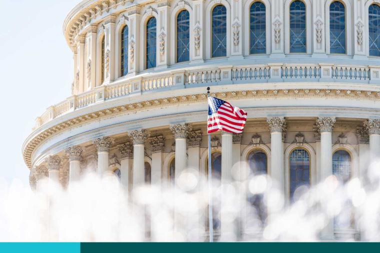 US Congress dome closeup with background of water fountain splashing, American flag waving in Washington DC, USA closeup on Capital capitol hill, columns, pillars