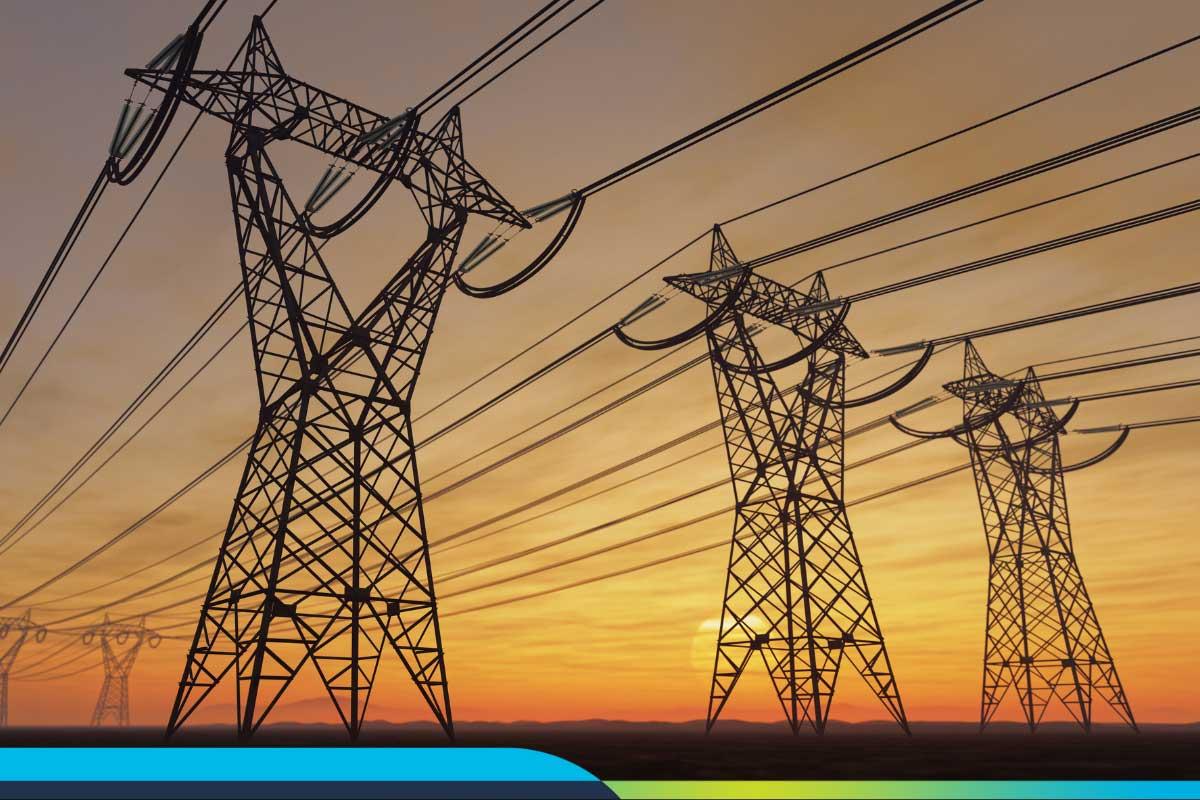 3 power lines against a sunset sky