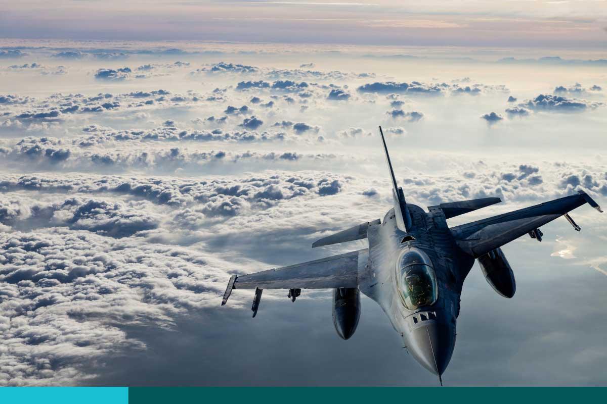 Fıghter Jet flying over clouds